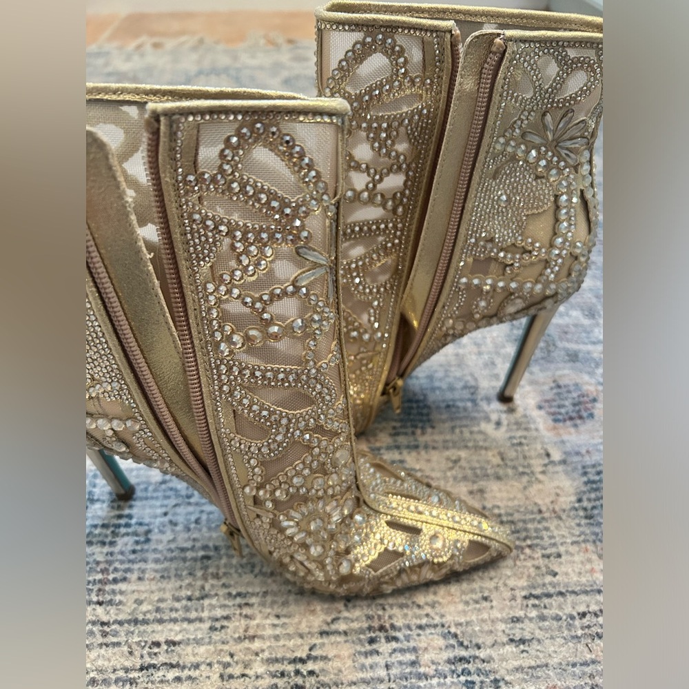 Betsy Johnson. Gold ankle boots